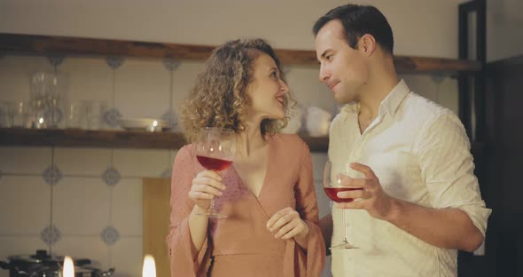 Happy Couple Dancing in Kitchen