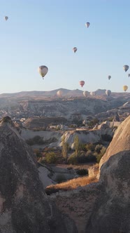 Vertical Video of Hot Air Balloons Flying in the Sky Over Cappadocia Turkey