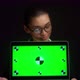 Woman Holds a Green Laptop Screen and Shows No with Her Head - VideoHive Item for Sale
