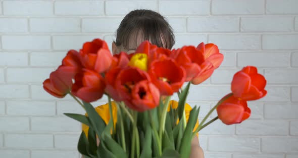 Teen with tulips.