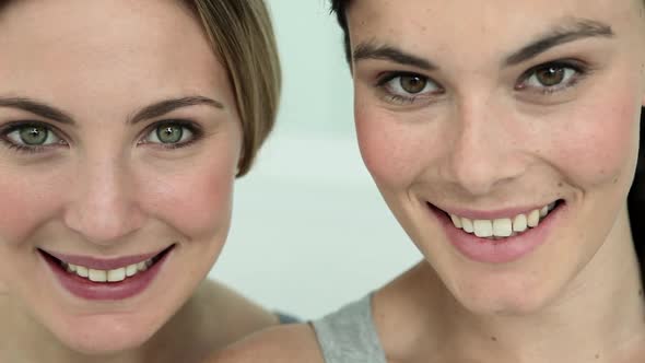 Two Young Woman Laughing, Close Up