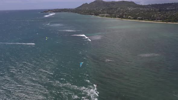 Aerial view of kitesurfer sailing along Waialae beach in Oahu Hawaii 2