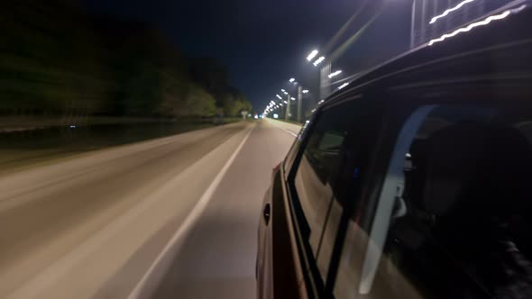 Drivelapse From Side of Car Moving on a Night Highway Timelapse Hyperlapse