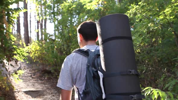 Man Travels Through The Woods