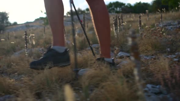 Closeup View of Young Man is Hiking in Countryside on Summer Day Spbd