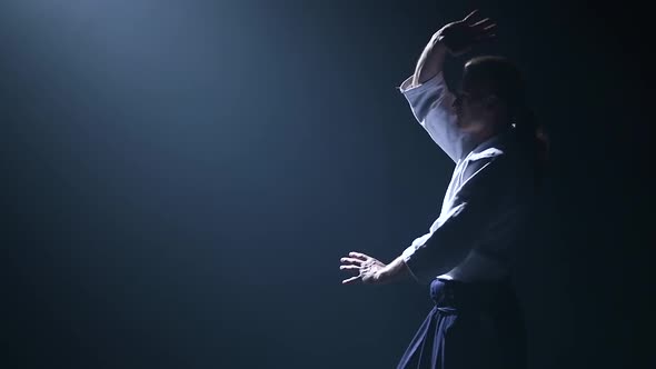 Aikido Master Technique Demonstration on Black Studio. Slow Motion. Close Up.