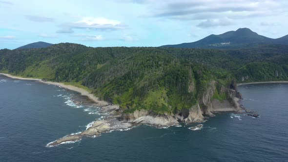 Cape Stolbchaty Volcanic Rock Formation on Kunashir island, Lesser Kuril Chain, Russia.