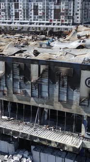 Vertical Video of a Destroyed Building of a Shopping Center in Bucha Ukraine