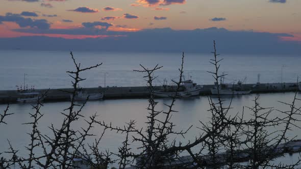 Timelapse of Dockyard with Fishing Boats in the Evening