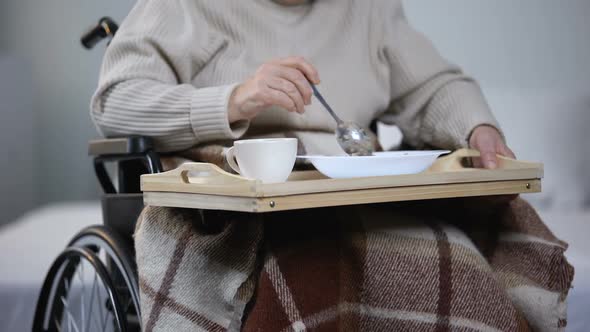 Handicapped Lady Reluctantly Eating Dinner in Medical Center, Inappropriate Care