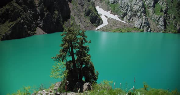 Mountain Lake of green and blue color Urungach. Located in Uzbekistan, Central Asia. 8 out of 20