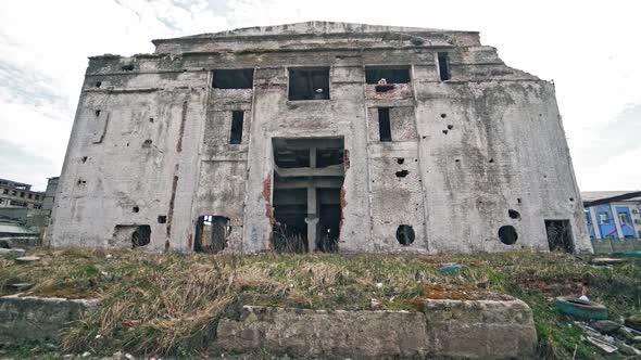 Abandoned industrial building. Ruins of an old factory.