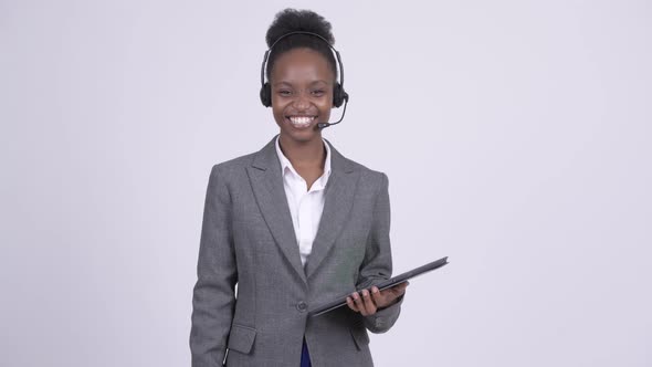 Young Happy African Businesswoman As Call Center Representative with Digital Tablet