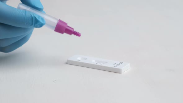 Drop Reagent on the Rapid Antigen Covid19 Test for Checking the Health Monitoring