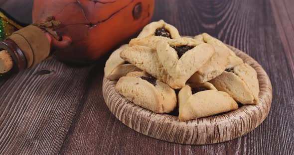 Traditional Jewish Hamantaschen Cookies Cakes with Purim Celebration Background
