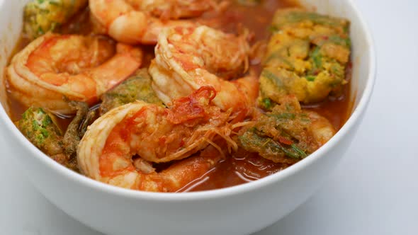 Close-up Footage of Kaeng Som Cha Om Kung (Sour Soup With Acacia Omlette and Prawn), The Popular Tha