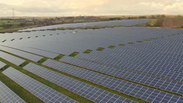 A solar farm in Staffordshire, thousands of Solar Panels capturing the sun's natural light and conve