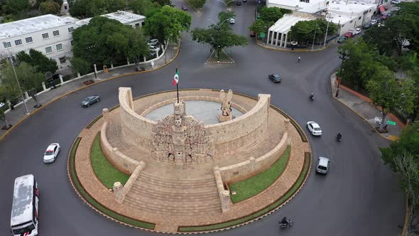 Slow aerial orbit to left showing the Monument a la Patria, Homeland Monument on the Paseo de Montej