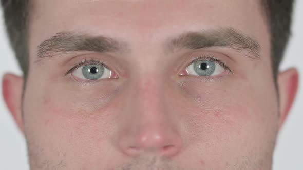 Close Up of Blinking Eyes of Young Man