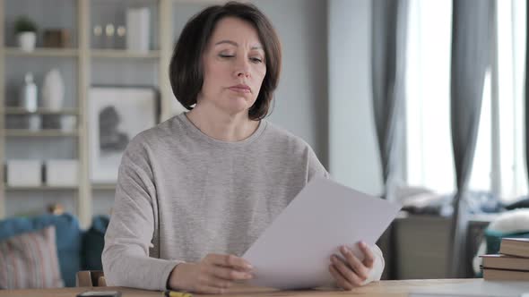 Old Senior Woman Reading Documents, Paperwork