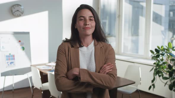 Woman Standing With Arms Crossed