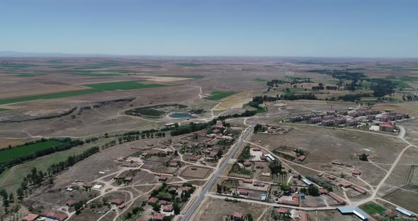 Village Lake And Vast Field Aerial View