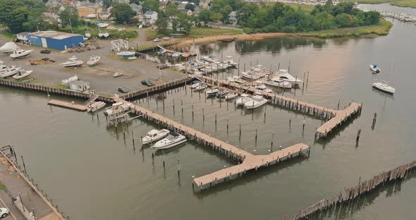 Aerial View Harbor Pier for Many Boat Near the Ocean Bay