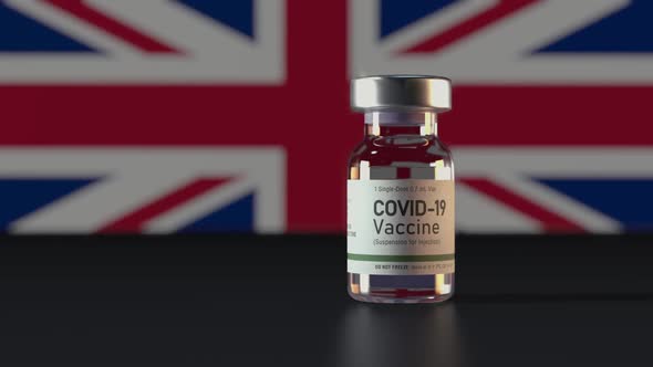 Covid Vaccine Ampule with UK Flag in Background