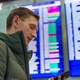 Young Man Looking at Flight Schedule at Airport - VideoHive Item for Sale