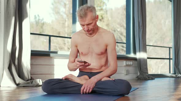 Portrait of an Athlete Talking on a Cell Phone