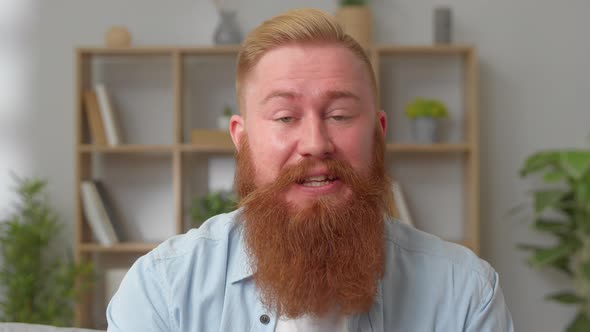Smiling Redhead Guy Wave Hand Greets Friend Start Talk Via Videoconference Head Shot Portrait