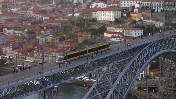 Train on Dom Luis Bridge and Douro River