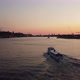 Small boat in Stockholm at golden hour - VideoHive Item for Sale