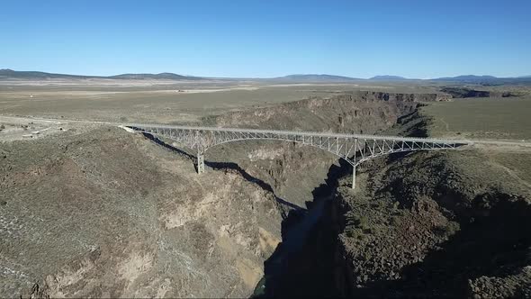 Drone video of the Rio Grande Gorge Suspension Bridge Colorado New Mexico Taos Snow