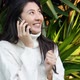 Slow Motion Young Asian Woman Use the Phone with Earphones While Walking - VideoHive Item for Sale