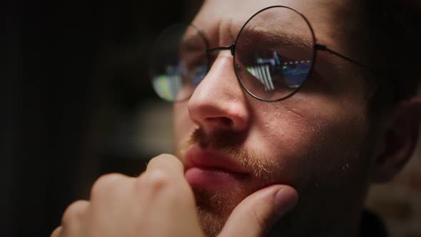 Close up of man working on computer. Shot with RED helium camera in 8K