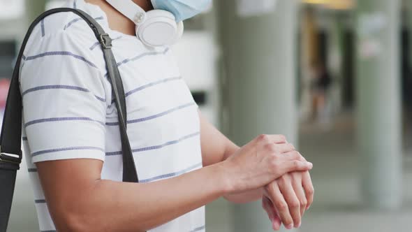 Side view of Caucasian man wearing a coronavirus Covid19 mask