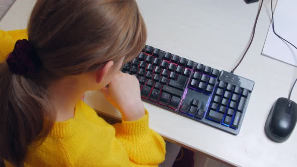 Girl Studying The Computer Keyboard