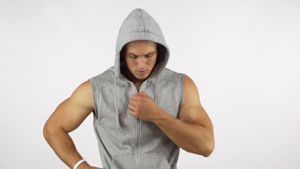 Strong Muscular Man Wearing Hoodie, Looking Fiercely To the Camera 1080p