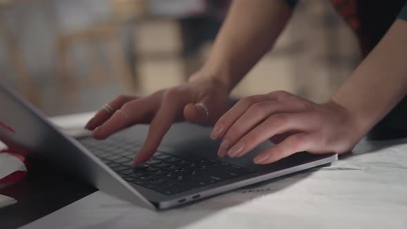 Hands Of Woman Working On Laptop