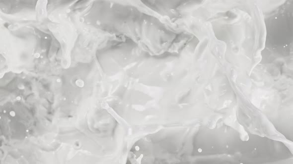 Super Slow Motion Shot of Splashing Fresh Milk at 1000 Fps alt