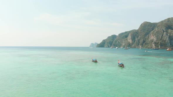 Abundant Turquoise exotic waters stretching beyond the horizon encircled by Ko Phi Phi Don Island 