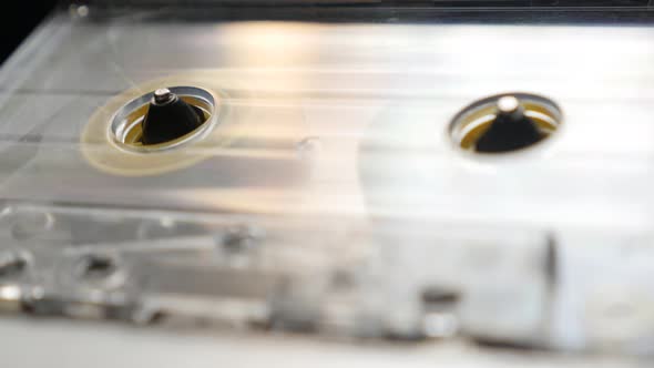 Plastic transparent  cassette in casettophone  4K 2160p 30fps UltraHD footage - Close-up of supply s