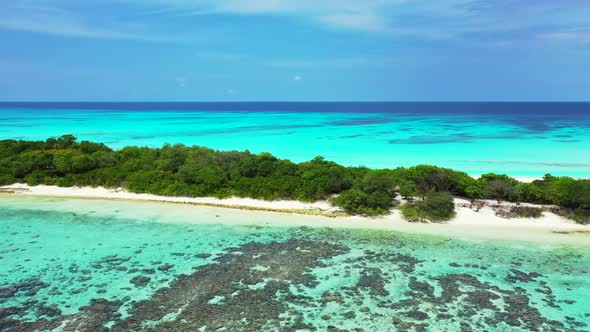 Aerial top view tourism of relaxing shore beach holiday by blue lagoon with white sandy background o