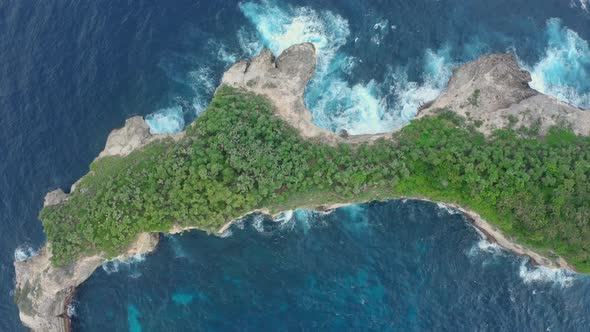 Aerial View of the Drone Moves Away From the Mesmerizing Promontory Overgrown