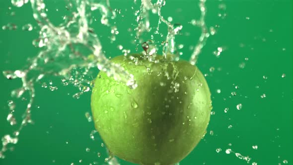 Super Slow Motion Green Apple with Water Droplets