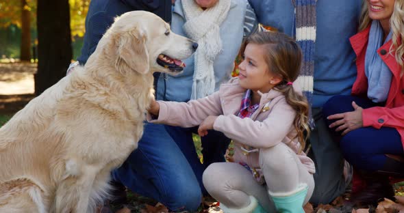 family with dog outdoors