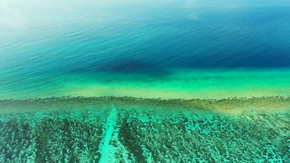 Aerial view nature of tropical bay beach holiday by transparent ocean with white sand background of 