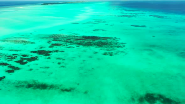 Aerial seascape of tranquil lagoon beach trip by blue green lagoon and white sand background of jour