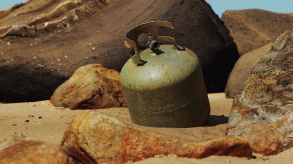 Old Cooking Gas Cylinder on Sand Beach